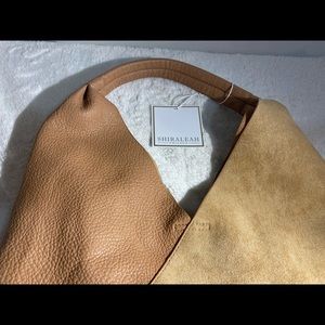 Shiraleah Chicago brand new with tag 
Tan .